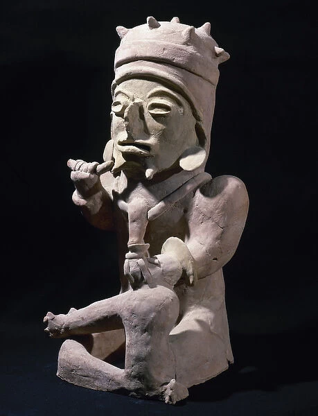 Bahia Culture (Mahia, Ecuador). Male figure sitting cross-le