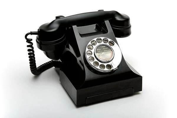 Bakelite telephone. Dial telephone with bakelite casing