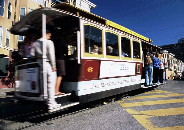 Cable car on a street in San Francisco, California, USA