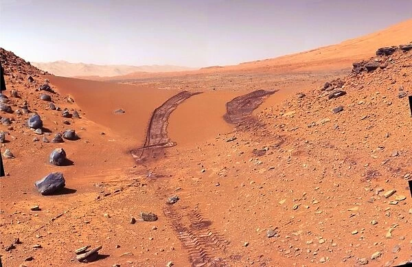 Tracks of the Curiosity rover on Mars. View looking back at a dune that NASA's