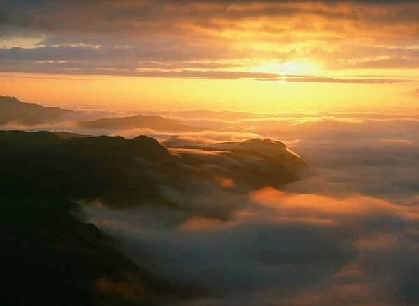 Sunset over a temperature inversion in the Eskdale Valley, Lake district, UK