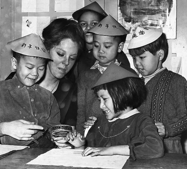 CHINESE NEW YEAR, 1966. Students and their teacher celebrating Chinese New Year