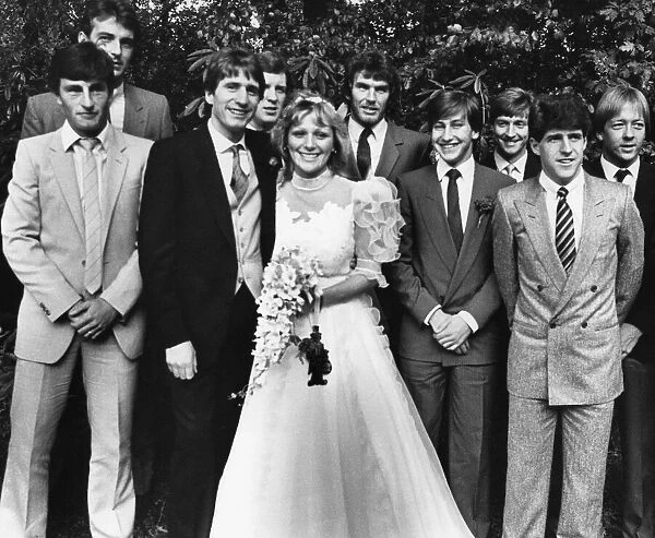 Aston Villa star Gordon Cowans and his bride, Jackie, are surrounded by friends from