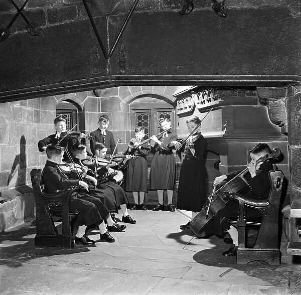 Orchestra, in traditional uniform of Chethams hospital (School), Manchester
