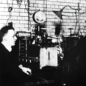 Rutherford and Geiger in laboratory