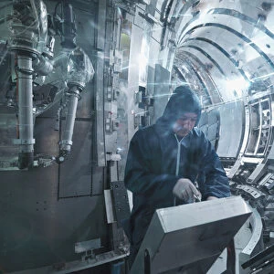 Scientist Working In A Fusion Reactor F003 / 6438