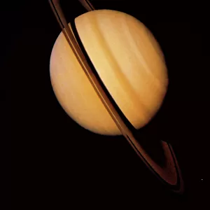 Voyager 1 image of Saturn & three of its moons
