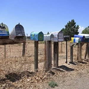 Painted rural mailboxes, Galisteo, Santa Fe County, New Mexico, United States of America, North America