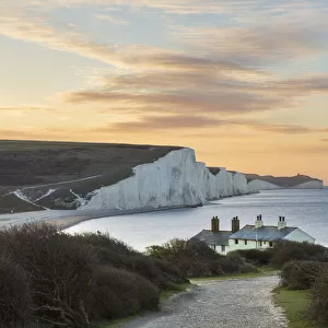 Seven Sisters and Beachy Head with coastguard cottages at sunrise in spring, Seaford Head