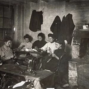 HINE: SWEATSHOP, 1908. Group of women sewing garments in a sweatshop in New York City