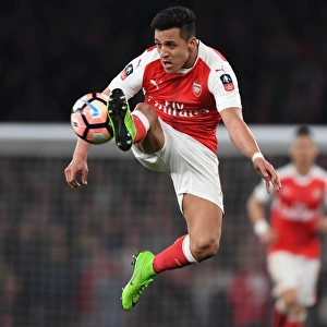 Alexis Sanchez in Action: Thrilling FA Cup Quarter-Final Moment for Arsenal against Lincoln City