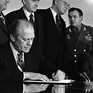 G. Ford and L. Brezhnev signing SALT treaty
