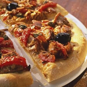 Red Pepper with Tuna and Sage, pizza with risen crust, richly topped with pieces of tuna, strips of red pepper and whole olives, section