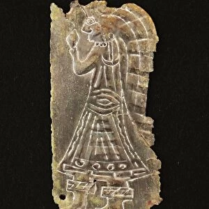 Votive bronze lamina representing woman wearing traditional clothing