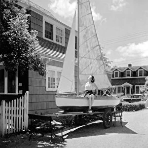 A Woman On Sailboat At Home