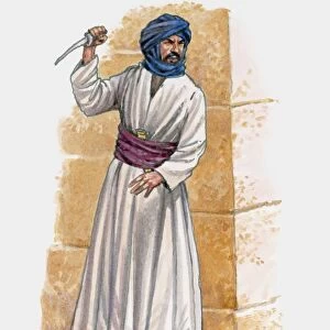 Middle eastern man standing near wall holding knife