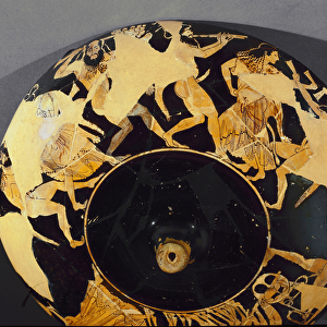 Type B kylix: representation of a frenzy dance of satyres and menades
