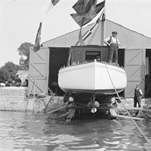 Saunders motor launch on slipway ready for launching, 1908. Creator: Kirk & Sons of Cowes