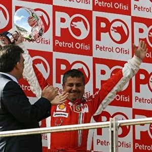 Formula One World Championship: Francesco Uguzzoni Ferrari Chief Mechanic received the Constructors Trophy on the podium