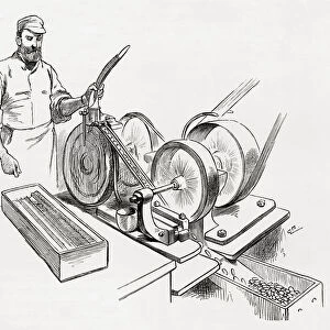 A worker at a coin rimming machine, the Royal Mint, London, England in the 19th century. From London Pictures, published 1890