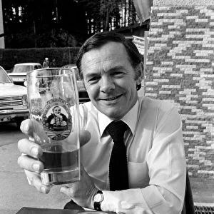 A man drinking a pint of beer in Munich, West Germany May 1975