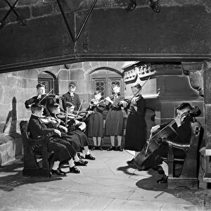 Orchestra, in traditional uniform of Chethams hospital (School), Manchester