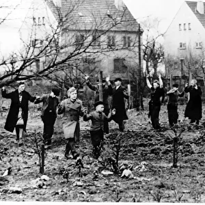 WW2 - March 1945 German civilians emerge from their homes as the 35th U. S