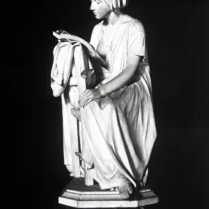 Marble statue portraying a woman reading by Pietro Magni, located at the Galleria d'Arte Moderna, Milan