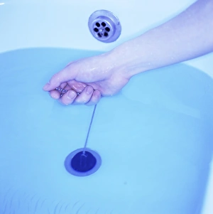 Drain Prints: Bath plug being pulled