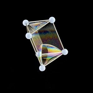 Liquid Prints: Soap bubbles on a triangular prism frame